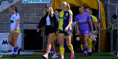Roxy Thomas of Torquay United leads the teams out during the FA Womens National League Division 1 South West match between Torquay United Women and Ascot United Women at Plainmoor, Torquay on Sunday 23rd August 2026 - PHOTO: Frankie OKeeffe/PPAUK