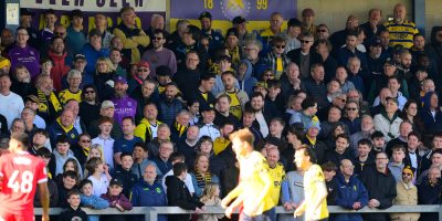 Torquay United fans at a packed Plainmoor during the National League South match between Torquay United and Bath City at Plainmoor, Torquay on Monday 6th April 2026 - PHOTO: Frankie OKeeffe/PPAUK