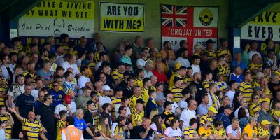 Torquay United fans during the National League South match between Torquay United and Enfield Town at Plainmoor, Torquay on Saturday 9th August 2025 - PHOTO: Frankie OKeeffe/PPAUK