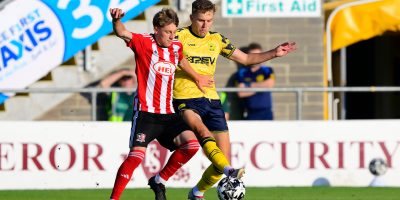 Dan Hayfield of Torquay United challenges for the ball with George Birch of Exeter City during the pre season friendly match between Torquay United and Exeter City at Plainmoor Torquay, Devon on Saturday 25th July 2025 - PHOTO: Frankie OKeeffe/PPAUK