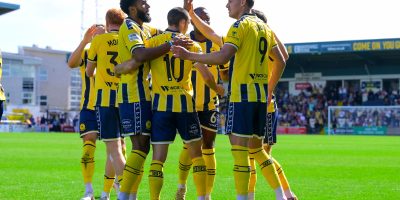 Goal celebrations for Cody Cooke of Torquay United during the National League South match between Torquay United and Hampton & Richmond Borough at Plainmoor, Torquay on Saturday 29th August 2026 - PHOTO: Frankie OKeeffe/PPAUK