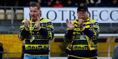 Michael Westcott, Co-Chairmen of Torquay United and Mark Bowes-Cavanagh, Co-Chairmen of Torquay United wish the Torquay United fans a Merry Christmas during the National League South match between Torquay United and Hemel Hempstead Town at Plainmoor, Torquay on Saturday 21st December 2024 - PHOTO: Frankie OKeeffe/PPAUK