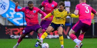 Dylan Morgan of Torquay United challenges for the ball with Ricky Korboa of Tonbridge Angels during the National League South match between Torquay United and Tonbridge Angels at Plainmoor, Torquay on Saturday 6th December 2025 - PHOTO: Frankie OKeeffe/PPAUK