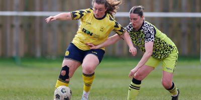 Connie Pengelly of Torquay United Women battles for the ball with Katie Jones of Forest Green Rover Women during the South West Regional Women's Football League match between Torquay United Women and Forest Green Rovers Women  at The Rec, Newton Abbot on 22 March 2026 (Photo: Phil Mingo/PPAUK)